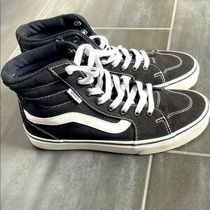 Vans women’s Black High-Top Sneakers